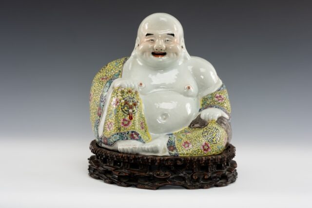 8 Chinese Porcelain Figure of Budai SOLD 1000
