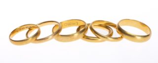 Six 22CT Gold Rings